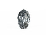 Upright BIOORGA silver ring showing its ribbed central design.