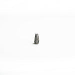 A vertical view of the silver biomechanical septum clicker, focusing on its detailed ridges and symmetrical design.