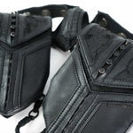 Close-up of the KERO Unisex Lightweight Leather Holster Bag by Kaya Movement, made from luxurious sheep skin leather. Featuring intricate stitching and metal studs, it's an ideal accessory for Burning Man festivals. The rugged, textured leather design creates a detailed and robust appearance, perfect for completing a post-apocalyptic harness bag ensemble.