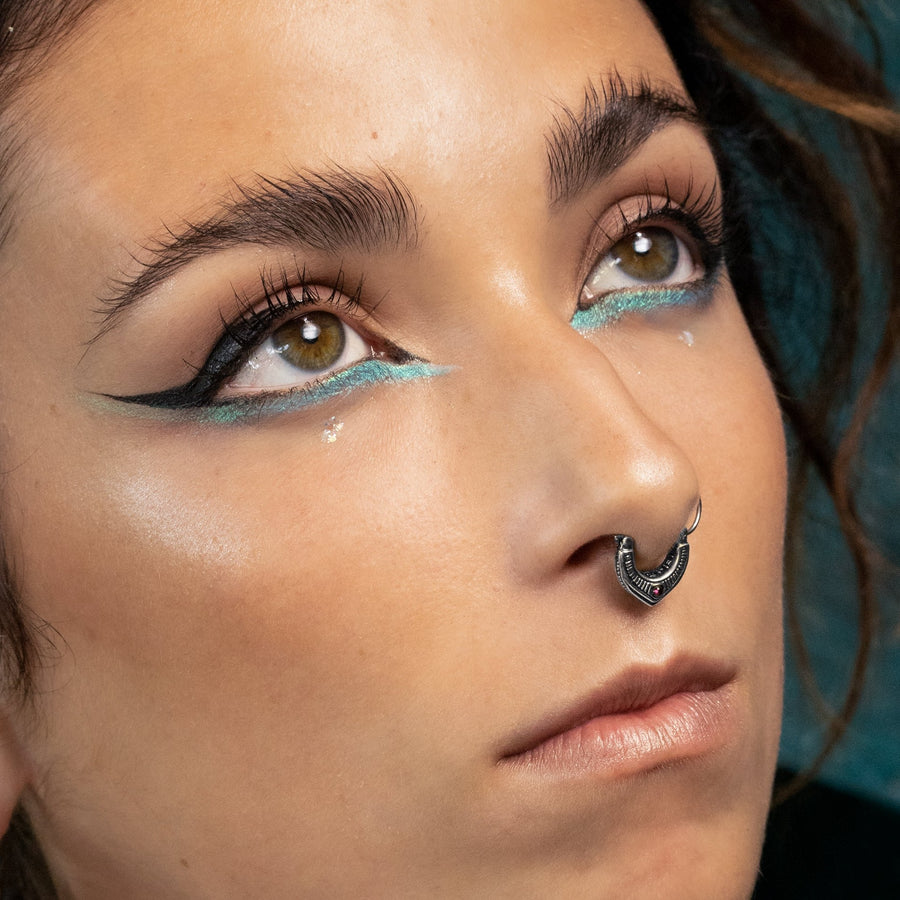 Channel your inner rebel with this biomechanical septum ring, crafted for those who dare to be different.