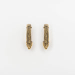 Image of a pair of Kaya Movement's MARVDASHT Small Cyborg Hoop Clicker Ear Weights in Gold, designed in 2 gauge. These sophisticated ear weights feature an intricate, textured design with pointed tips, bridging the gap between post-apocalyptic body jewelry and timeless fashion. Suitable for both formal and casual wear, they offer an elegant appearance perfect for any occasion.
