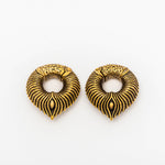 A pair of MARVDASHT Medium Cyborg Clicker Ear Weights in Gold by Kaya Movement, meticulously crafted with a lion's mane-inspired pattern. These 3/18" gauge hoop ear weights feature a detailed, textured surface accented with dark highlights that emphasize the intricate design against a plain white background.