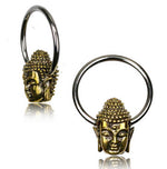 The BUDDHA Silver Rings with Gold Pendants from Kaya Movement showcase two circular jewelry pieces, each adorned with a golden Buddha head pendant. The intricate design features detailed facial features and textured hair. These versatile piercing hoop earrings are displayed from various angles, emphasizing the meticulous craftsmanship of the pendants. Available in 18, 16, or 14 gauge sizes.