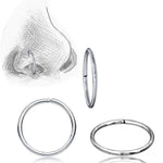 This collection features the INDUS Seamless Minimalist Hoop Ring in Silver (20 gauge) by Kaya Movement. The upper left illustration depicts a nose adorned with one of these minimalist rings inserted, while the other rings are showcased against a white background, highlighting their circular shape and metallic sheen.