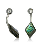Presenting the TUR Diamond Belly Piercing Ring by Kaya Movement, a 14 gauge navel barbell that showcases metallic balls on one end and diamond-shaped abalone shell inlays on the other. The iridescent green and blue patterns of the abalone shell beautifully contrast with the silver surgical steel barbells, which feature a curved design ideal for navel piercings.