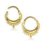 Presenting the Kaya Movement's Hinged Teardrop Tribal Septum Ring Clicker, a pair of small gold hoop earrings designed for multiple body piercings such as conch, daith, and helix. These intricate circular earrings feature elaborate detailing along the bottom edge with tiny gold beads hanging in a row, reminiscent of tribal jewelry. The earrings come with a convenient latch-back closure for secure wear.