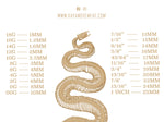 A stylized snake slithers upwards in the center of the image, surrounded by gauge sizes on the left (18G to 00G) with corresponding millimeter measurements, and fractional sizes on the right with conversions. The biomechanical-inspired aesthetic is complemented by www.kayamovement.com displayed at the top, featuring their Fractal Alien Bio-Organic Circle Ear Weights - Modern Brass 4mm (6ga) Gauges, Grunge Edgy Tribal Earrings for Stretched Lobes.