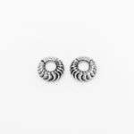 A pair of Fractal Alien Bio-Organic Circle Ear Weights from Kaya Movement, featuring a detailed, textured design resembling overlapping feathers or scales. The intricate pattern adds a three-dimensional effect, enhancing their biomechanical-inspired aesthetic against a plain white background. Made with modern brass and designed for 4mm (6ga) stretched lobes, these grunge edgy tribal earrings perfectly blend art and function.