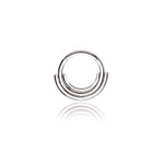 The Lira Minimalist Boho Chic Septum by Kaya Movement features a pristine silver finish, made from 316L steel. Its design highlights a unique double-layered structure where the inner layer forms a perfect circle and the outer layer creates a partial arc that wraps around the bottom half. This exquisite piece of modern bohemian jewelry is elegantly showcased against a plain white background. The septum measures 1.2mm in gauge and 8mm in diameter, epitomizing refined modern style.