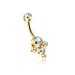The Kaya Movement’s Lysor 1.6mm Navel Piercing - Mandala Chic Inspiration features a gold finish with a curved barbell design made from surgical stainless steel. Adorned with six bright zircons of varying sizes at both ends—with a larger one at the top and smaller ones clustered at the bottom—it offers unmatched elegance, perfect for navel piercings and boho outfits.