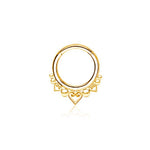 The Liora Minimalist Mandala-Inspired Septum by Kaya Movement is crafted from 316L steel with a gold finish. This elegant piece features intricate mandala design detailing adorned with small heart-shaped patterns around its base. Available in 1.2mm gauge and diameters of 6mm, 8mm, and 10mm, the septum boasts a smooth, polished finish and is displayed against a plain white background.