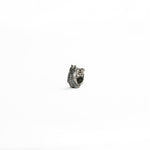 A close-up of a Silver 925 bioorganic septum clicker, featuring an intricate biomechanical-inspired design with a secure clicker closure, displayed on a clean white background.