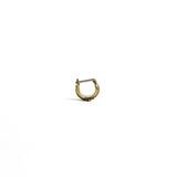 Front view of a single brass septum ring with an intricate handcrafted design, set against a white background.