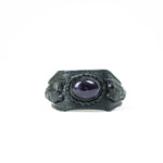 The ANOM Men's Black Cuff Leather Bracelet by Kaya Movement features a genuine Amethyst gemstone at its center, complemented by intricate detailing and stitching against a white background.