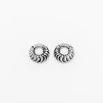 A pair of AARO Cyborg Clicker Hoop Ear or Septum Weights in 925 silver by Kaya Movement, featuring a small, round shape with a textured, scalloped design. The 6-gauge earrings are arranged side by side on a plain white background.