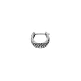 A close-up image of the Darma Biomechanical Clicker Hoop Septum Nose Ring in Silver by Kaya Movement, featuring intricate detailing on the outer surface that resembles a petal or leaf pattern. The 16-gauge nose ring, reminiscent of post-apocalyptic body jewelry, is positioned against a plain white background.