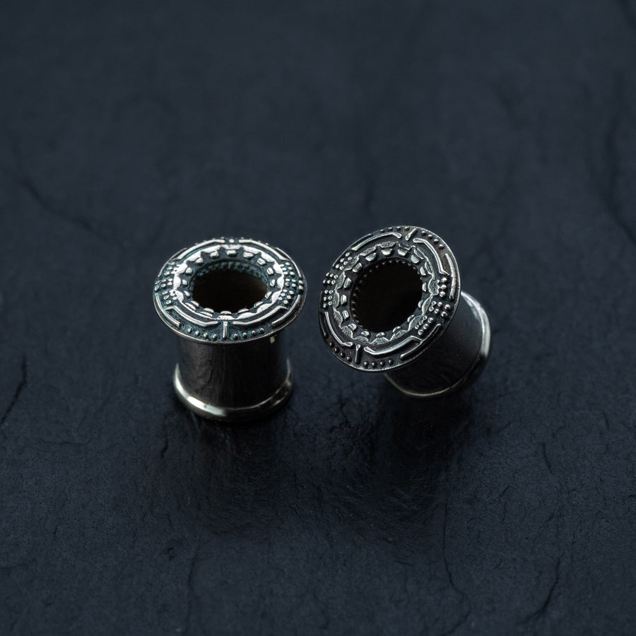 Cyborg Gauges in metal, featuring an intricate design suitable for both men and women. Available in sizes 8mm to 20mm.