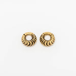 A pair of AARO Cyborg Clicker Hoop Ear or Septum Weights in Gold Brass by Kaya Movement, featuring a textured, feather-like pattern. These 6 gauge earrings have a hoop design suitable for stretched ear piercings and are positioned against a plain white background.