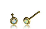 Presenting the EDEN Nose Pin Studs by Kaya Movement, available in Gold featuring round, iridescent White Opal gemstones. The opals exhibit a mesmerizing play of colors with subtle hints of blue, green, and pink. These elegant pieces evoke the natural beauty found in stone body jewelry and are beautifully showcased against a white background with visible reflections beneath them.