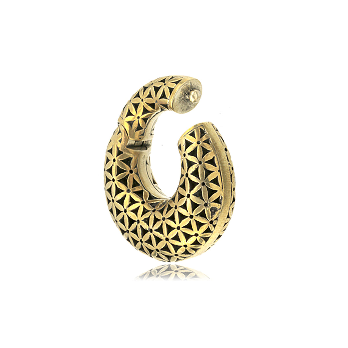 The FLOWER OF LIFE Hoop Ear Weights in Gold with Clicker by Kaya Movement feature an intricate geometric pattern. The slightly open circular design, suitable for a 2 gauge, showcases both inner and outer surfaces adorned with a repeating flower of life motif, adding an elegant touch to this body jewelry piece.