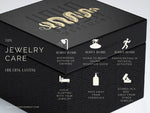 Displayed is a black jewelry box adorned with gold and white geometric patterns. The lid features the words "Kaya Movement." On the left side, text offers care tips for 925 silver body jewelry, such as removing it before certain activities and avoiding chemicals, with icons depicting each tip. Inside is the SHA Beaded Flower Nose Ring in Silver & Turquoise, 20 gauge from the Kaya Movement brand.