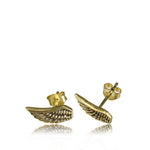 The EL Angel Wings Stud Earrings in Gold by Kaya Movement, crafted from yellow brass, are displayed against a white background. Each earring features intricate feather engravings, creating a lifelike appearance. The earring posts and butterfly backings are visible alongside the wing designs, making them perfect for the ear lobe.