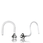 The TRINITY Nose Screw Stud by Kaya Movement, available in gold or silver and designed at 20 gauge, features a clear pair with small, silver-colored bead cluster designs at one end and a curved, hook-like shape for secure placement. The plain white background accentuates the simplicity and elegance of this body jewelry.