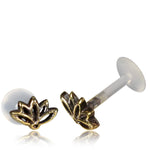 Introducing the LOTUS Labret Stud in Gold by Kaya Movement, a pair of exquisite 16 gauge gold-tone stud earrings featuring a tribal ethnic lotus design with transparent backs. These elegant gold brass jewelry pieces are perfect for adding a touch of sophistication to any look.