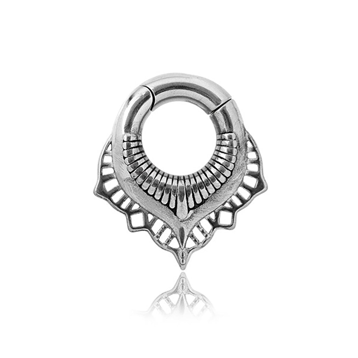 A close-up of the Sacred Lotus Flower Ear Weights in Silver with Magnet Closure by Kaya Movement. The earring, crafted in a circular shape, features an intricate fan-like openwork design at the bottom with symmetrical geometric patterns. The reflective piece bears a resemblance to tribal ear weights and adds a shiny appearance.