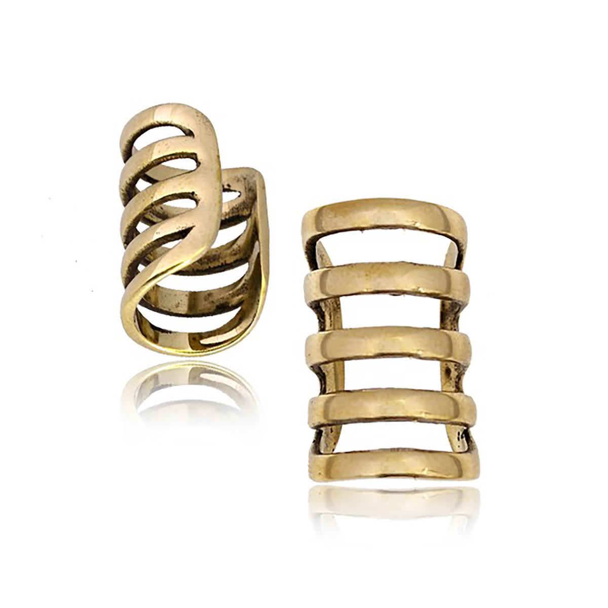 Two KIRA Long Cage Ear Cuffs in Gold from Kaya Movement are displayed side by side on a white background. One ear cuff is shown at an angle to emphasize its curved, overlapping bands, while the other highlights its parallel horizontal bars and adjustable size.