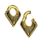 Introducing the Steel Triangle Ear Weights in Gold with Magnet Closure by Kaya Movement. These gold-plated PVD earrings feature a striking triangular design adorned with evenly spaced small gold beads along the edges. Enhanced by a black accent along the inner sides, they showcase a detailed and elegant aesthetic. The closure system includes one closed earring and one open earring for added versatility. Available in 2 gauge size, these earrings are perfect for making a stylish statement.