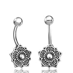 Introducing the Boho Short Belly Button Rings Curved Barbell Silver Lotus Flower by Kaya Movement. These navel industrial piercings are crafted from surgical steel and showcase intricate lotus flower designs with delicate dotted details. Featuring a curved barbell shape, they are adorned with a polished ball on one end and the exquisite floral pattern on the other, adding a touch of ethnic body jewelry elegance.
