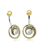 The Kaya Movement Belly Button Teardrop Piercing Jewelry is perfect for navel piercings, featuring a unique design with gold-colored circular swirls and small beads, centered by a mother of pearl or white stone. The upper part of each ring showcases a polished gold ball. Ideal for any body jewelry collection.