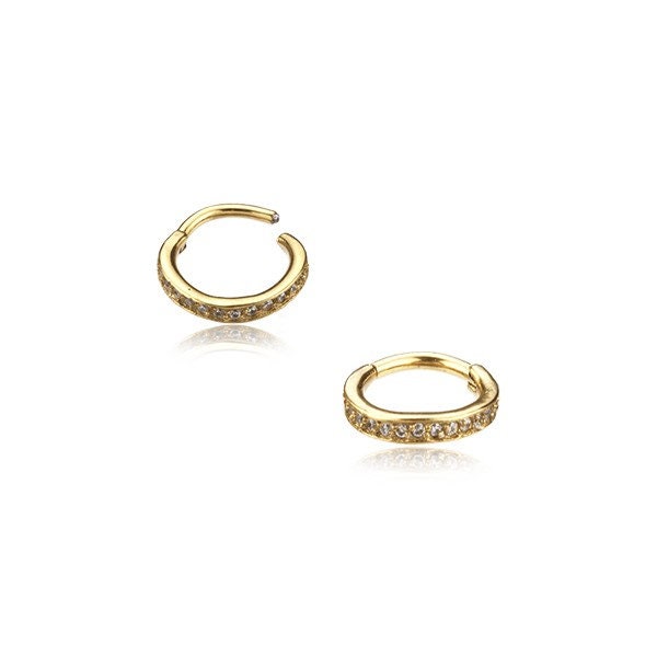 A pair of sophisticated Hinged Septum Ring Clickers by Kaya Movement, each adorned with small, sparkling cubic zirconia stones. The delicate, open-ended design of these 16g hoops is crafted to catch the light beautifully. Photographed against a plain white background, the intricate details and shine of this versatile Conch Hoop—ideal for CZ Daith Piercing, Helix Body Piercing, Cartilage Earrings, and Rook piercings—are exquisitely highlighted.