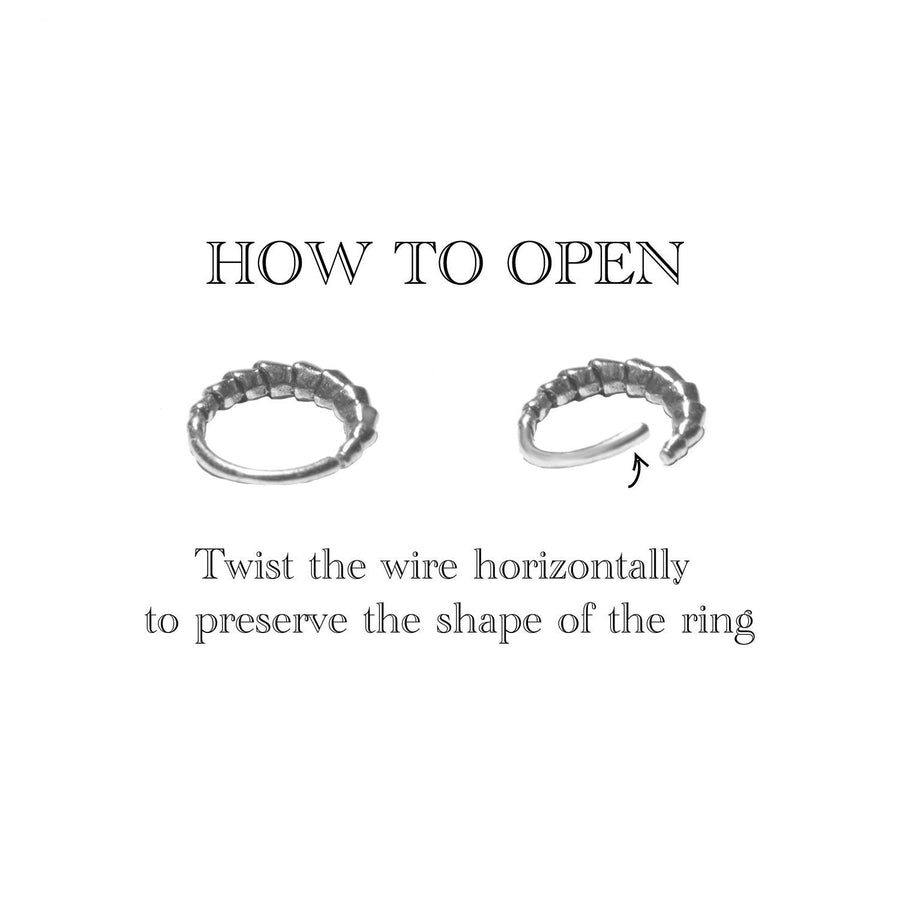 An instructional image, titled "How to Open," features two images of the Kaya Movement Septum 925 Sterling Silver with Turquoise Stone. The left ring remains closed, while the right ring demonstrates one end twisted open slightly to the side. The accompanying text advises twisting the wire horizontally to maintain the ring's shape.