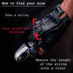 A gloved hand holding a motorcycle handle. Text overlays instruct "How to find your size: Take a string, Wrap around your Knuckles, Measure the length of the string with a ruler." Red arrows highlight the wrapping process around the knuckles. Perfect for motorcycle enthusiasts and gothic fashion lovers, Kaya Movement's Custom Dragon Scale Leather Gloves (Fingerless Motorcycle & Driving Gloves) are ideal post-apocalyptic goth stagewear and biker riding accessories.