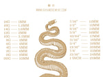The image features a coiled snake skeleton with a detailed gauge-to-millimeter size conversion chart for sterling silver body jewelry. The chart includes sizes ranging from 18G (1.2MM) to 1 INCH (25MM), listed on either side of the snake. Above the image, the website www.kayamovement.com is noted, showcasing products like Black Pearl Belly Rings, Silver Navel Tribal Bars, Hippy Lotus Piercing, and Shell Mother Pearl Button Bar by Kaya Movement.