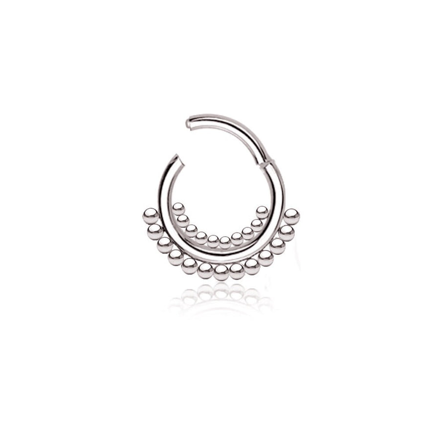 Introducing the Kaya Movement Bohemian Ethnic Septum in 316L steel "Bohra" – a silver, open-ended hoop earring featuring a delicate row of tiny, evenly spaced beads along the lower half. This elegant piece has a 1.2mm gauge and an 8mm diameter, perfectly displayed on a white background with a faint reflection underneath.