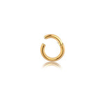 Against a plain white background, the Aurel Simple Ear Ring by Kaya Movement is showcased in all its minimalist elegance. This single gold hoop earring, which is open at the clasp, features a shiny and smooth 316L Steel Gold PVD finish. Its subtle reflection appears just beneath it. Available in gauges of 2 or 3mm and diameters of 8, 10, 12, and 14mm, this piece truly exemplifies refined simplicity.