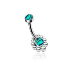 The Kaya Movement Bohal Navel Jewelry - Boho Essence with Abalone Shell features a silver curved barbell belly button ring, adorned with two stunning abalone shell-inspired stones. The larger stone is set in a decorative circular setting at one end, while the smaller stone is elegantly mounted at the other end. This piece of bohemian elegance showcases iridescent blue and green hues, crafted from 316L surgical steel.