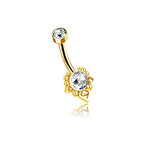 The Kaya Movement Zarina Navel Piercing - Golden Mandala Floral Design exudes bohemian elegance with its gold finish and sparkling zircon gemstones. The top gem is small and round, while the bottom one is larger and oval-shaped, set in a beautifully ornate gold design adorned with intricate beads and heart-shaped details. Perfect for achieving a chic bohemian look against any white background.